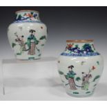 A pair of Chinese famille verte porcelain vases, Transitional style but late Qing dynasty, of
