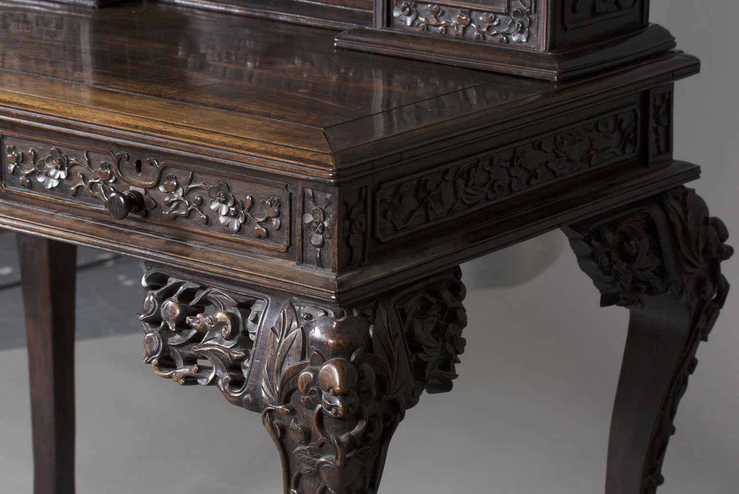 A Chinese hardwood writing desk with carved blossoming prunus decoration, late 19th century, the - Image 14 of 14