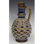 A Doulton Lambeth stoneware jug, dated 1874, the ovoid body decorated by George Tinworth,