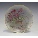 A Japanese Satsuma earthenware circular dish, Meiji period, painted and gilt with a pair of quail