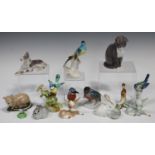 An assorted collection of pottery and porcelain bird and animal models, 20th century, including a
