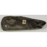 A Danish Neolithic chipped and part polished flint axe, bearing 'F.S. Clark Collection' label,