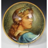 A Doulton Lambeth decorated Pinder, Bourne & Co faience pottery circular plaque, late 19th