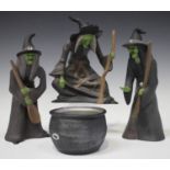 Three Brian Wood studio pottery witches and a cauldron, contemporary, each witch with green face and