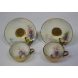 A pair of Royal Worcester porcelain cabinet cups and saucers, 1921 and 1922, painted by Ernest