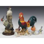 A collection of porcelain birds, including a Beswick Leghorn, No. 1892, and a Nuthatch, No. 2413,