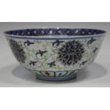 A Chinese doucai enamelled porcelain bowl, mark of Guangxu and possibly of the period, the