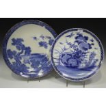 A Japanese blue and white porcelain charger, early 20th century, painted with birds and flowers,