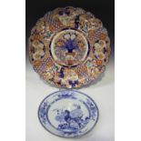 A Japanese Imari porcelain dish, Meiji period, of lobed circular form, painted with a flower-