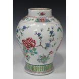 A Chinese famille rose export porcelain vase, Qianlong period, of baluster form, painted with a