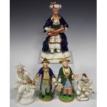 A pair of English porcelain figures of Oriental gardeners, possibly Derby or Rockingham, circa 1835,