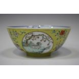 A Chinese yellow ground famille rose medallion bowl, mark of Guangxu but probably slightly later,