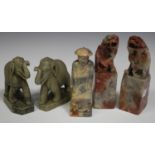 A pair of Chinese soapstone figures of Buddhistic lion and cub, early 20th century, each modelled