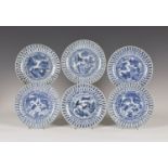 A set of six Chinese blue and white Kraak porcelain saucer dishes, Wanli period, each painted with a