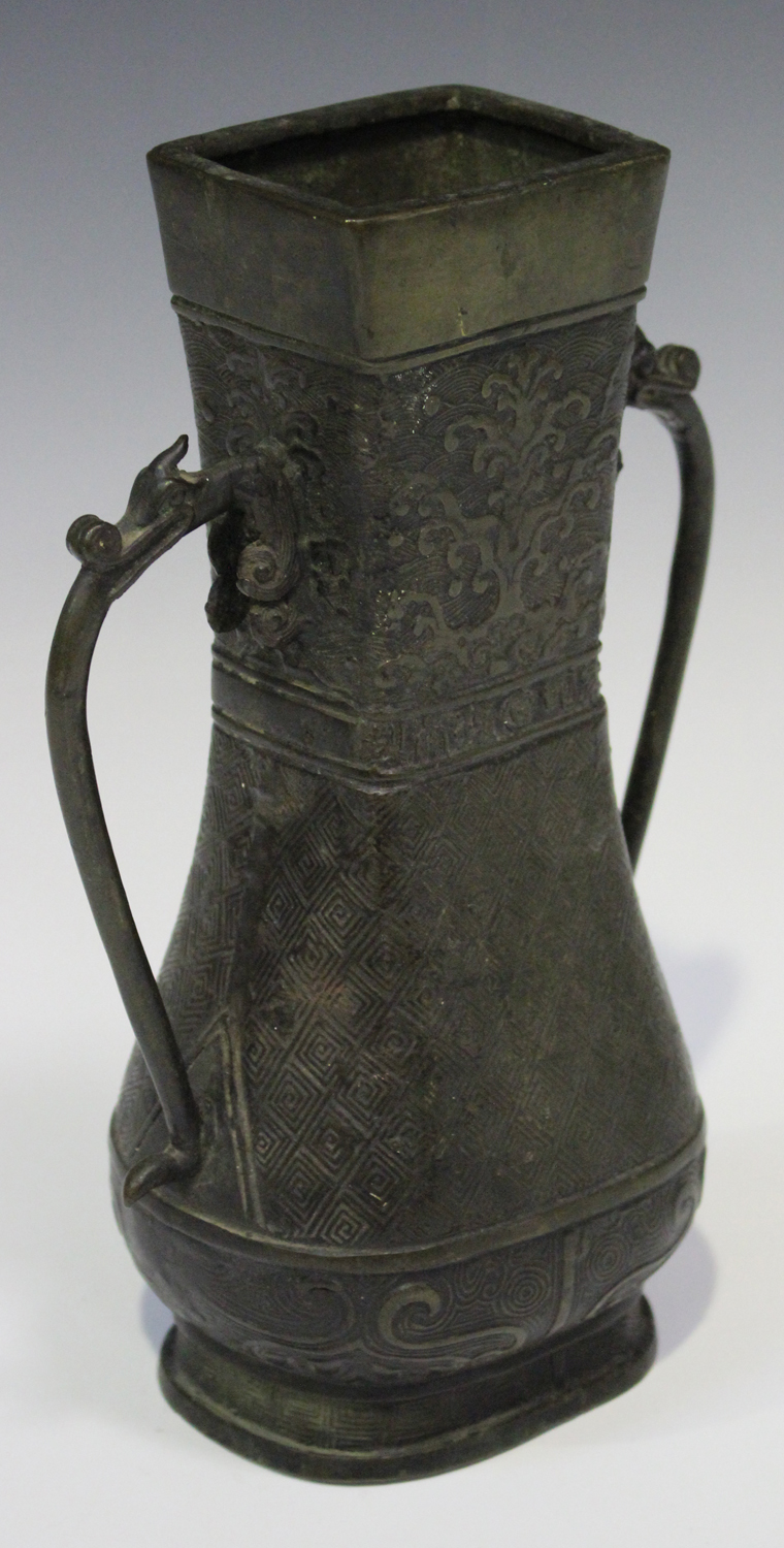 A Chinese Ming style dark brown patinated bronze vase, mark of Xuande but Qing dynasty, the low-