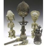 An Ashanti Akan Aku'ba type fertility figure, height 56cm, a group of other African carvings and a