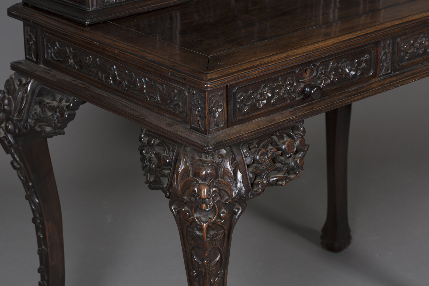 A Chinese hardwood writing desk with carved blossoming prunus decoration, late 19th century, the - Image 11 of 14