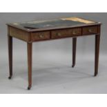 An Edwardian mahogany and foliate inlaid writing desk, fitted with three drawers, raised on square