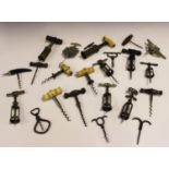 A selection of mainly 19th and early 20th century corkscrews, including a bronze barrel corkscrew