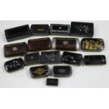 A collection of 19th and early 20th century papier-mâché and carved wooden snuff boxes, some with