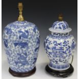 A modern Chinese blue and white transfer printed porcelain table lamp, decorated with overall