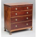 An early 20th century mahogany chest of four long graduated drawers by Waring & Gillow Ltd, raised