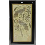 A late 19th/early 20th century Indian silk, silver thread and stumpwork panel, depicting two birds