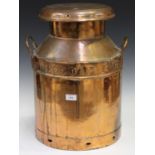 A copper milk churn, inscribed 'Howards Dairies Ltd, Westcliff-on-Sea', height 51cm.Buyer’s