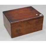 A late Victorian mahogany silver box, the lid hinged to reveal a compartmentalized interior lined