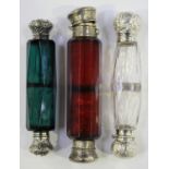 A late Victorian silver mounted cut clear glass double-ended scent bottle of faceted form, the