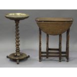 A Victorian walnut circular occasional table with brass tray top, height 75cm, diameter 39cm,