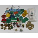 A collection of hunting and coursing badges, buttons and member passes.Buyer’s Premium 29.4% (