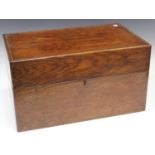 A large early 20th century oak writing box, the hinged lid enclosing a fitted interior, width 51cm.