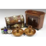 A George III mahogany canted rectangular tea caddy, the hinged lid inlaid with a shell patera, width