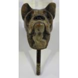 A late 19th century painted and carved wooden walking cane handle, finely modelled as the head of