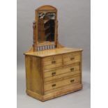 A late Victorian ash swing frame dressing chest of two short and two long drawers, on a plinth base,