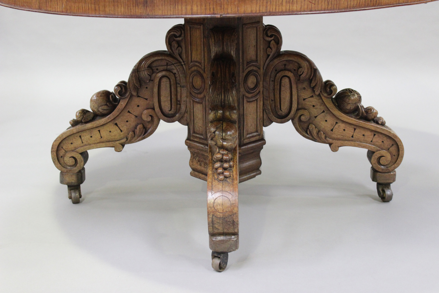 A late 19th century Continental oak circular centre table, the moulded top raised on an octagonal - Image 2 of 2