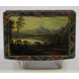 A Victorian Tartan ware rectangular snuff box, the hinged lid painted with a mountainous landscape