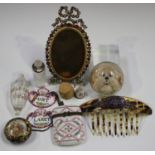 A mixed group of items, including a gilt metal and paste set frame, height 14.5cm, a marcasite and