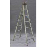 A pair of 20th century teak fruit pickers' ladders, height 207cm.Buyer’s Premium 29.4% (including