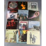 A collection of mainly rock LP records including albums by Black Sabbath, Pink Floyd, Taste, The