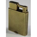 An Everest 9ct gold cased rectangular petrol lighter with engine turned decoration, import mark