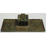 An early 20th century Egyptianesque bronze inkstandish, the central glass inkwell and rectangular
