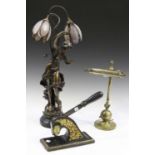 After Louis Moreau - a bronzed composition figural table lamp, modelled as a standing maiden, height