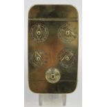 A 19th century brass snuff box, the hinged lid with four brass dials operating a combination lock,