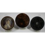 A late 19th century burr wood circular snuff box, the glazed lid inset with a painted portrait of