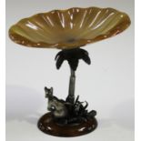 An agate and white metal tazza, the oval dish top raised on a palm tree stem, the oval base with a