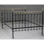 A Victorian style cast iron and brass mounted double bed frame, height 116cm, width 138cm, length