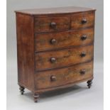 A Victorian mahogany bowfront chest of two short and three long drawers, on turned feet, height