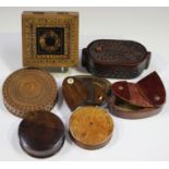 A group of seven mainly 19th century treen boxes, including a circular boxwood snuff box,